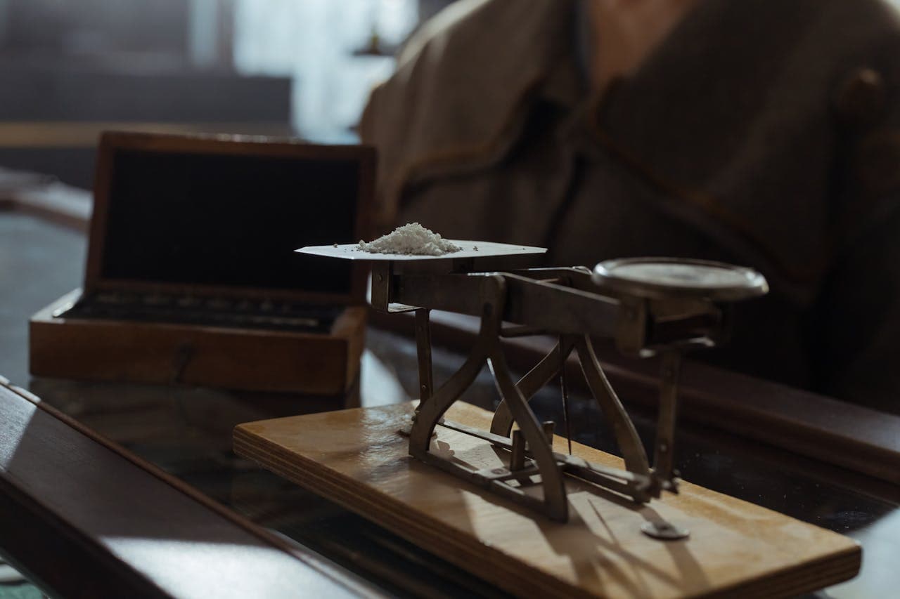 Balanced scales representing costs and value